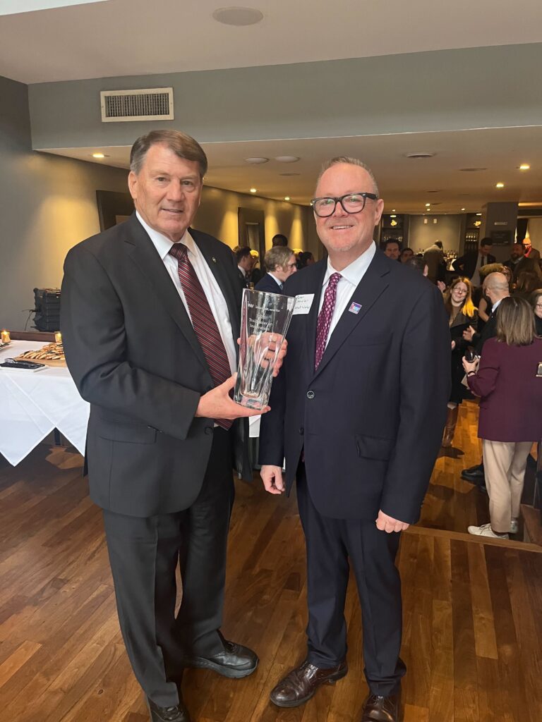 Senator Mike Rounds (R-SD) accepting Trailblazers in Innovation Award from IW Executive Director Peter Chandler.