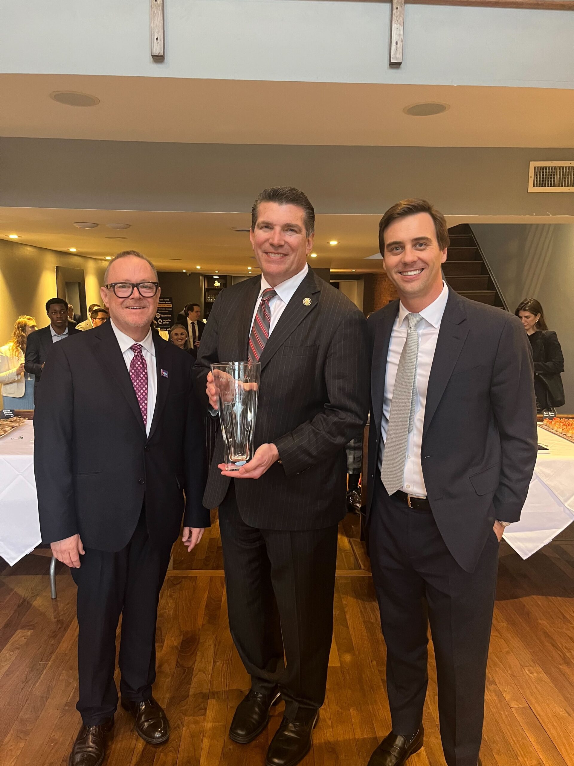 Congressman Jay Obernolte (R-CA-23) accepting Trailblazers in Innovation Award from IW Executive Director Peter Chandler and Dropbox Head of Government Affairs Robert Yeakel.